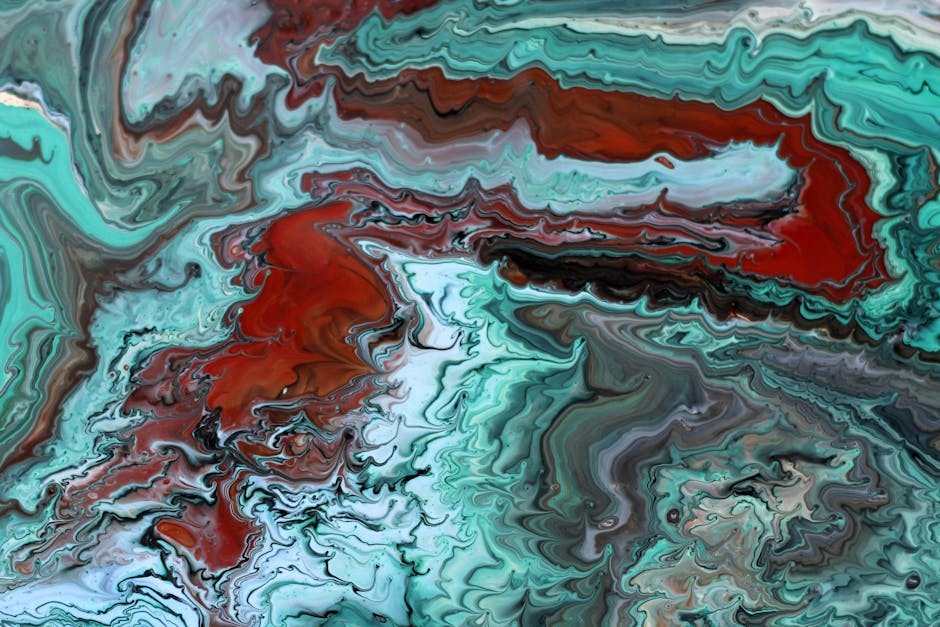 Vibrant abstract fluid art showcasing swirling turquoise and red hues with intricate patterns.