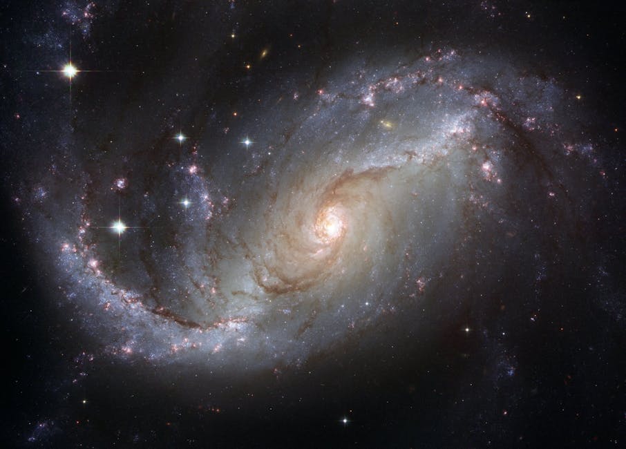 Capture of the NGC 1672 spiral galaxy showcasing its majestic spiral arms and bright core. Stephen Hawking